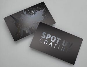 This is a small, rectangular card with a dark background. The card says, "Spot UV Coating" and has a giant splotch design on the back of it. A uv coating is used over the title and design to make it reflective and look a lighter color compared to the background. This helps it stand out to customers and business owners.