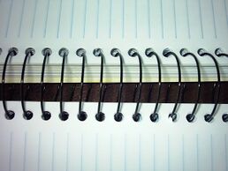 A spiral bound notebook.